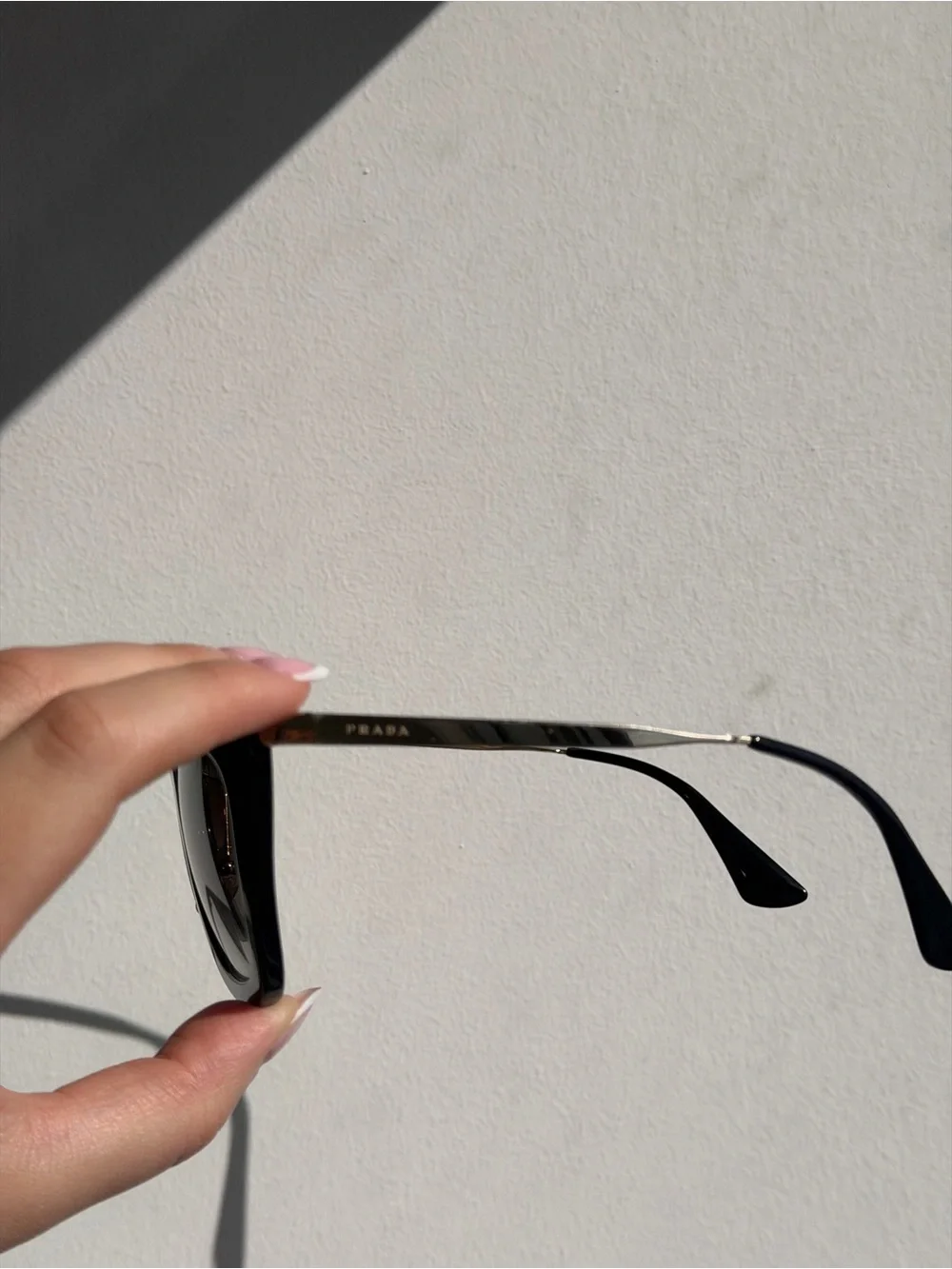 Prada Black Cat-Eye Sunglasses with Gradient Lenses
